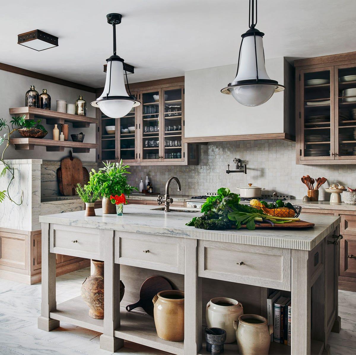 Modern modular kitchen with white cabinets and marble top