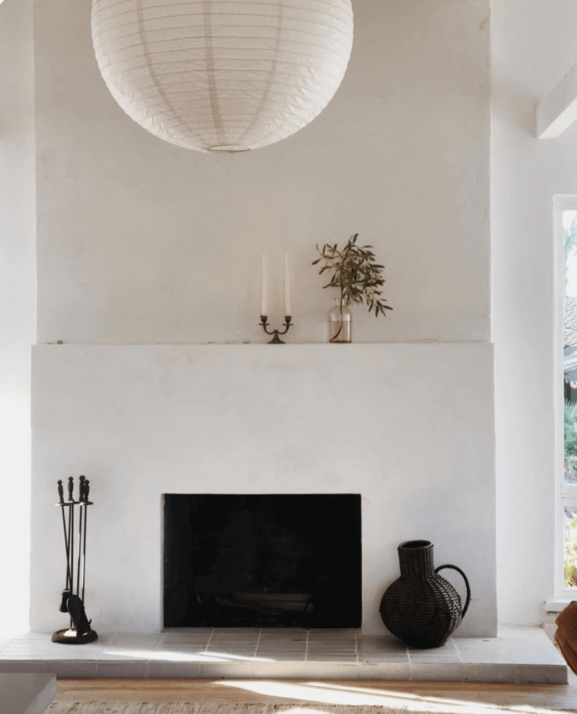 Warm lounge interior with fireplace and rug